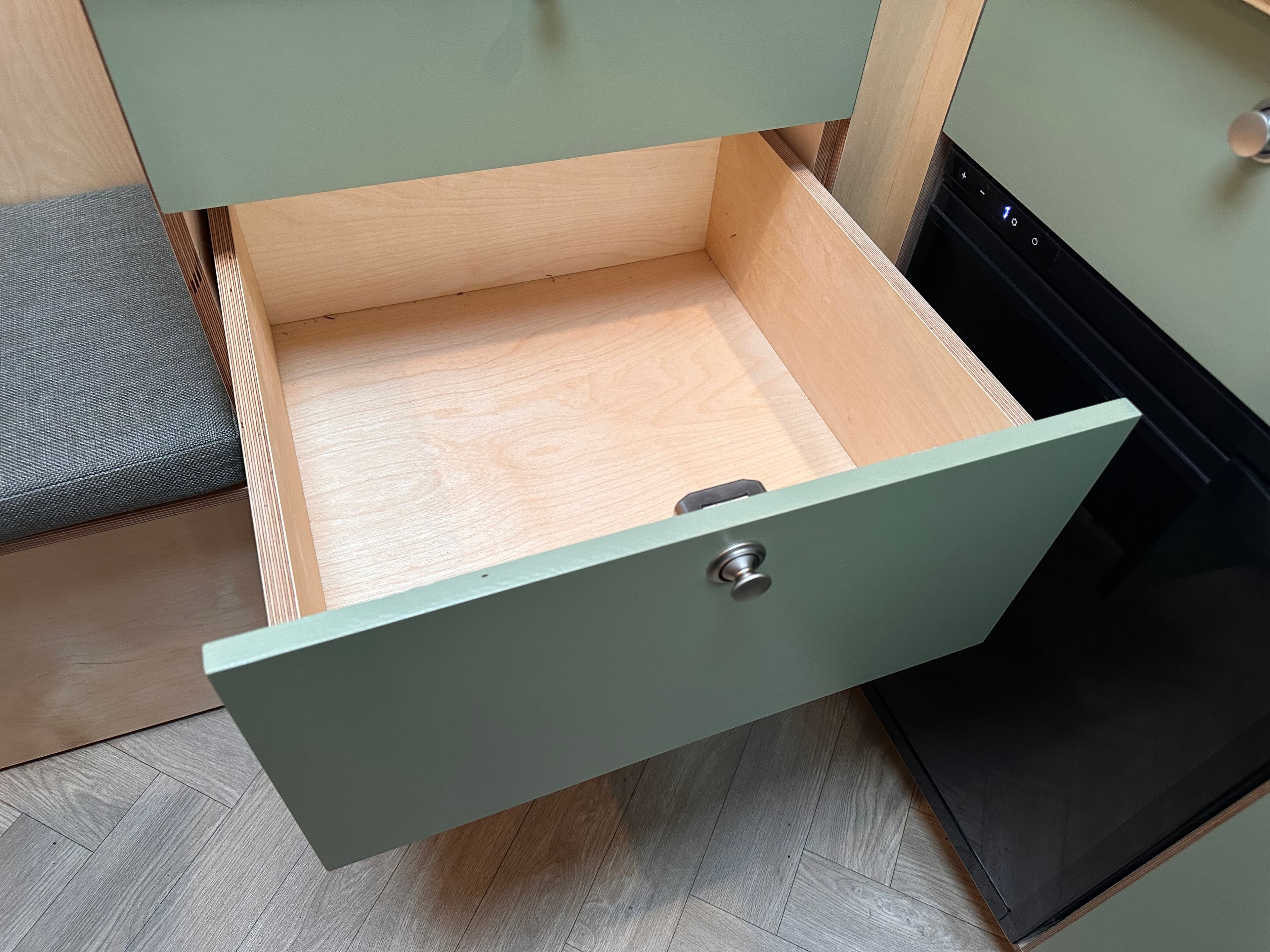 Campervan kitchen drawer with cutlery and utensils