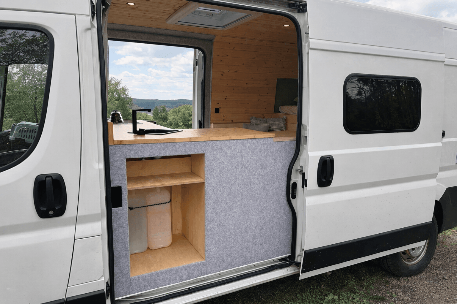 Campervan water tanks with transparent level gauge